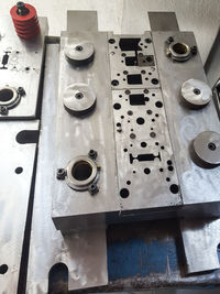 High angle view of machine part on table