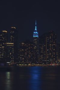 Illuminated buildings in city at night