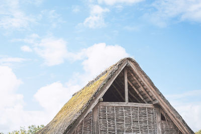 Low angle view of roof against sky