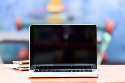 Close-up of laptop on table