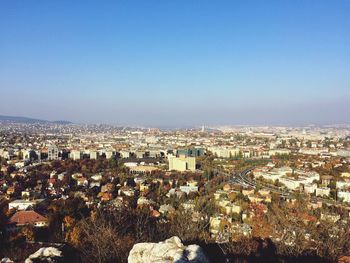 Cityscape against blue sky