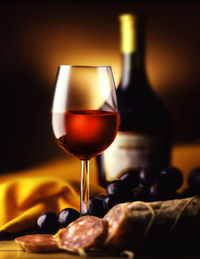 Close-up of wineglass on table