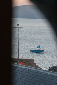 Nautical vessel on sea against sky