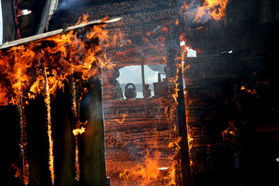 Panoramic view of fire on building