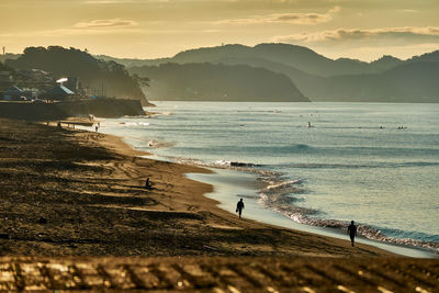 Scenic view of sea against sky during sunrise