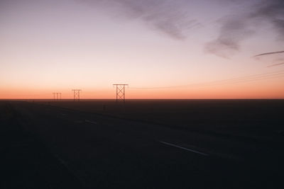 Scenic view of silhouette landscape against sky during sunset