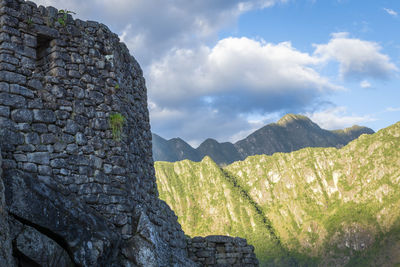 View of stone wall with mountain in background