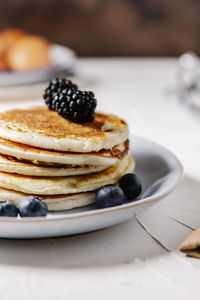 Close up of a stack of fresh homemade pancakes