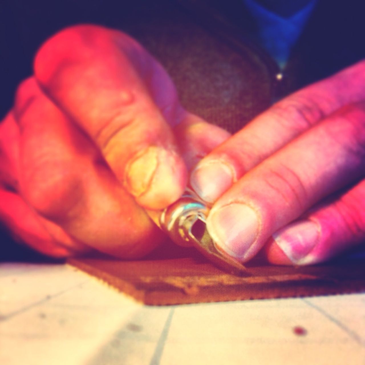 indoors, person, part of, cropped, table, close-up, human finger, selective focus, low section, unrecognizable person, holding, focus on foreground, lifestyles, food and drink, still life