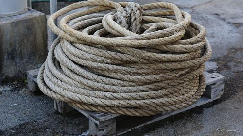 High angle view of ropes wound on pallet