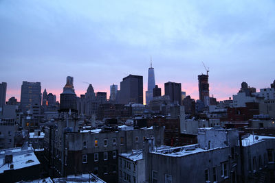 View of buildings in city against sky