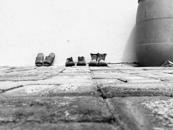 Shoes against wall