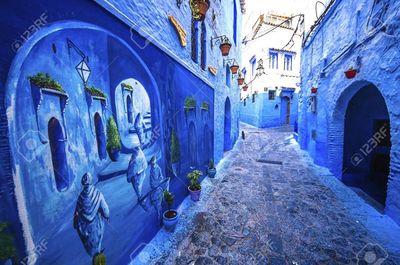 Alley amidst buildings in city