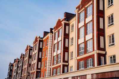 Low angle view of residential building against sky