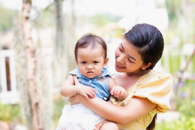 Portrait of mother and daughter