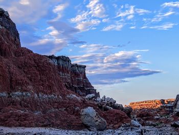 Low angle view of rock formation against sky