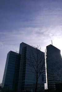 Low angle view of skyscrapers against sky