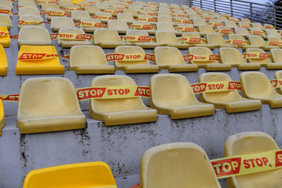 Full frame shot of yellow seats in row