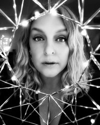 Portrait of beautiful woman at night