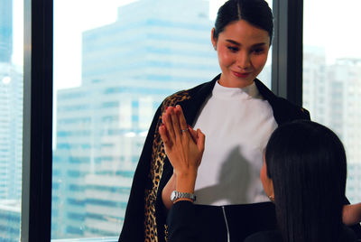 Woman working at window