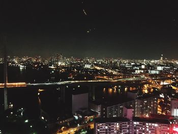 Illuminated cityscape at night