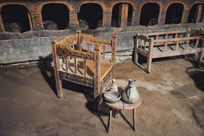 High angle view of empty chairs and table