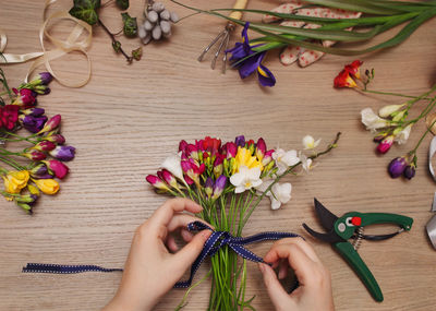 High angle view of hand holding bouquet