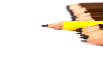 High angle view of pencils against white background