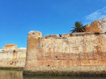 View of portuguese fort against blue sky, in el jadida, morocco 