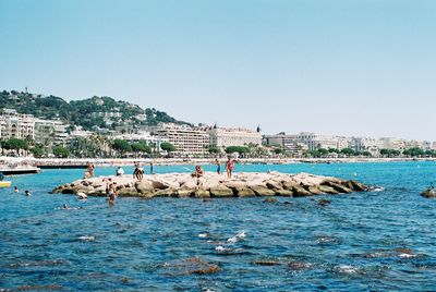 View of sea against clear blue sky