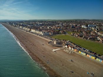 Seaford beach, uk. featuring the martello tower and stone beach.