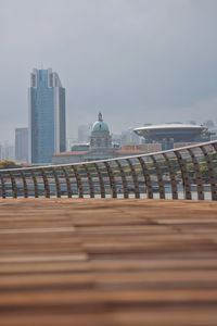 Buildings in city against sky