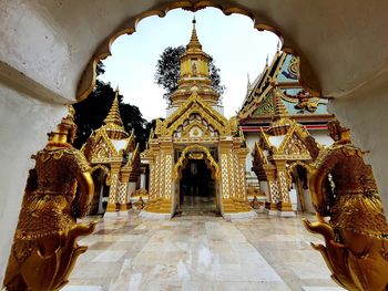 Statue of temple in building