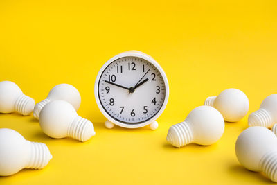 Close-up of clock on white background