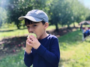 Portrait of boy holding ice cream