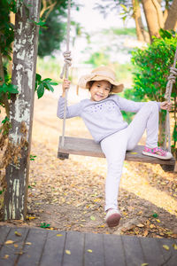 Portrait of cute girl wearing hat