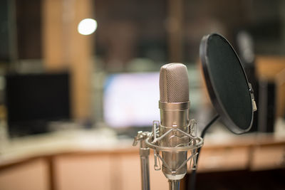 Close-up of microphone in sound recording studio