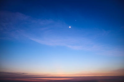 Low angle view of moon in sky