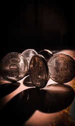 Close-up of coins on table