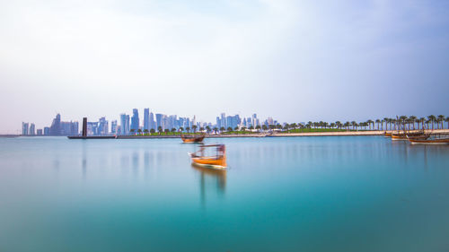 Scenic view of bay against sky