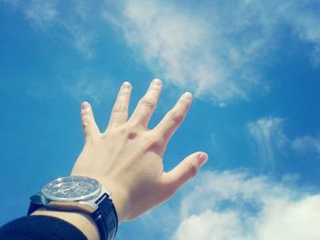 Low section of woman standing against clear sky