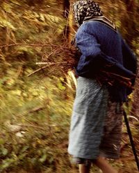Woman standing in the dark
