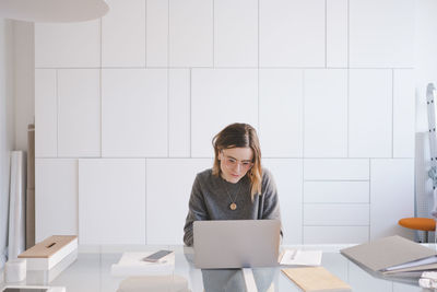 Young woman using mobile phone