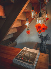 High angle view of illuminated lamp on table at home