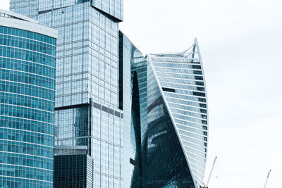 Low angle view of modern buildings against sky