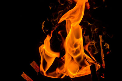 Close-up of fire against black background