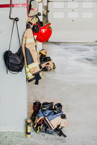 High angle view of shoes hanging on floor against wall