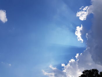 Low angle view of clouds in blue sky