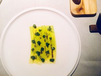 High angle view of bread in plate on table