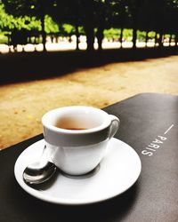 Close-up of coffee cup on table